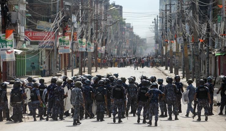 Standoff between Nepali Police and Civilian protestors in the streets of Kathmandu