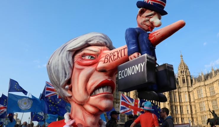 Float of Teresa May with a long nose
