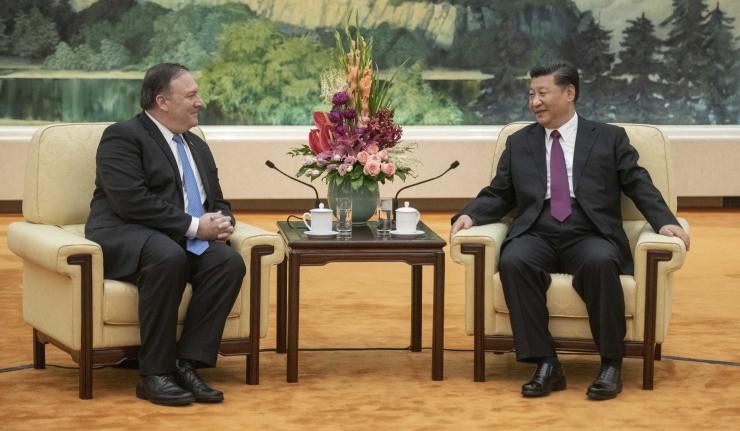 Xi Jinping and Mike Pompeo