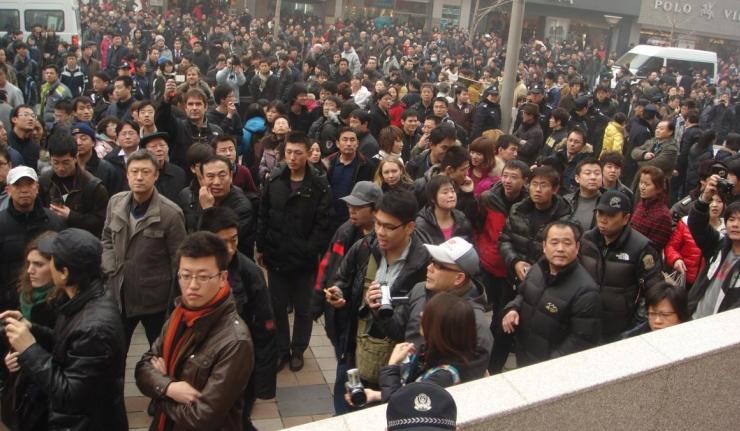 A large number of protestors at a public square in China A large number of protestors at a public square in China