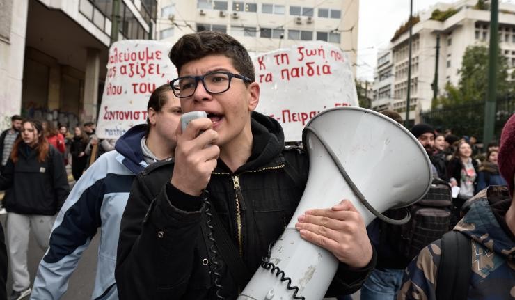 Protestor in Greece speaking into a Megaphone