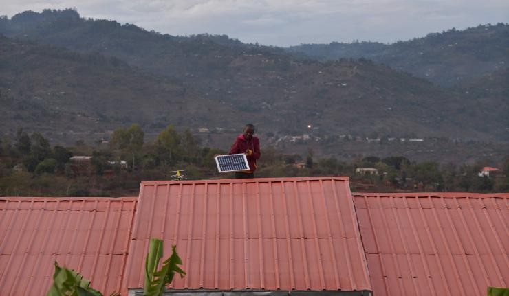 Single solar panel in a rural off-grid home Single solar panel in a rural off-grid home