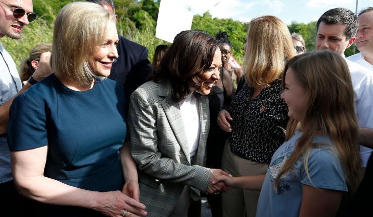 Prof Anita Hill shaking hands with a young girl Prof Anita Hill shaking hands with a young girl