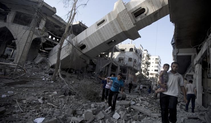 Dilapiated buildings and a collapsed tower in Syria Dilapiated buildings and a collapsed tower in Syria