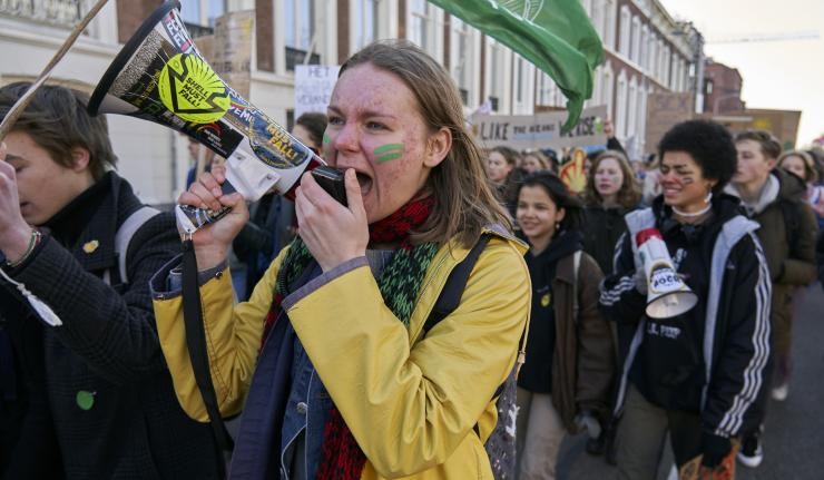 Climate protestors with megaphones