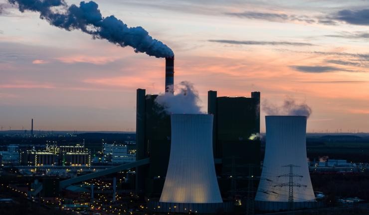 Factory releasing carbon into the atmosphere Factory releasing carbon into the atmosphere
