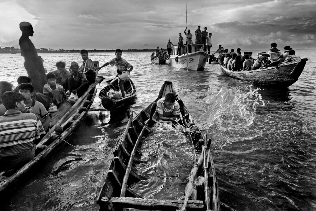 After the violence in June 2012 , a large number of refugees started to come to Bangladesh. In mid-June, 137 of them were caught by Bangladeshi border guards while trying to enter the country at night. The next morning, they were pushed back to the sea, using these broken boats. 132 of them died within hours at seas their boats sank.