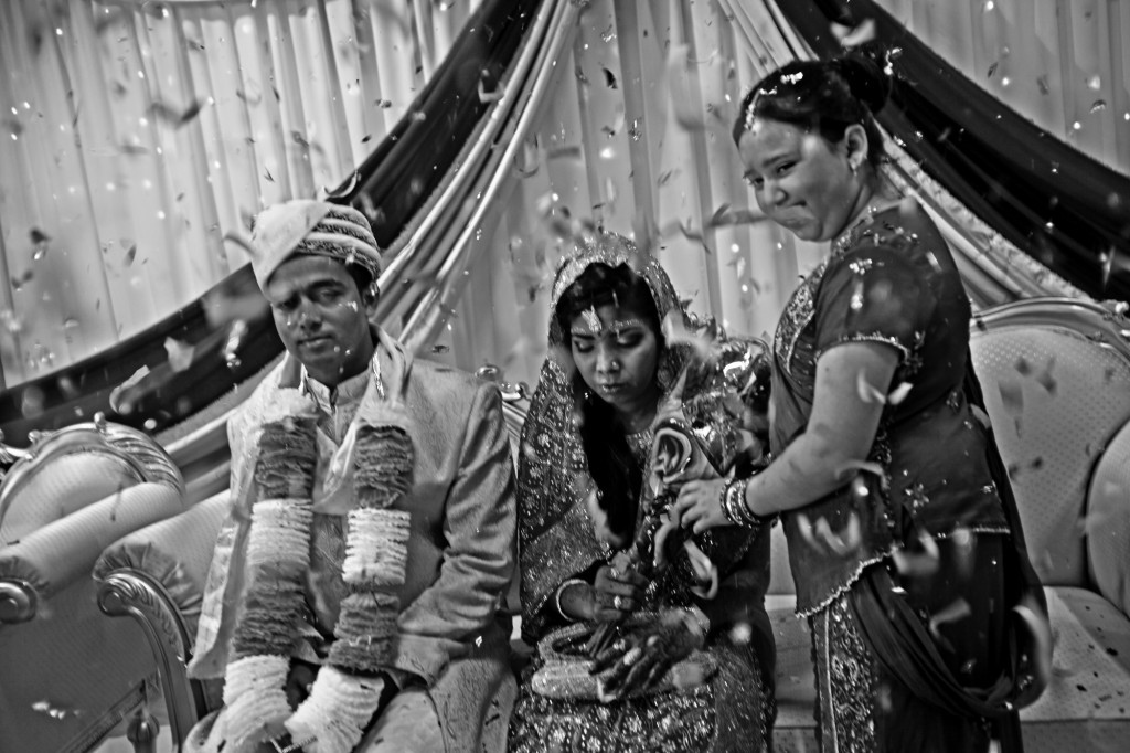 The first marriage between a Rohingya woman and a Bangladeshi man in Bradford. The husband is said to be an illegal worker. By getting married to the woman, he is confirmed to have a legal status. The Rohingya community was very skeptical about the marriage; they deeply fear that once the husband receives his legal status he would leave the wife and get married to a more beautiful Bangladeshi girl. The husband has paid the entire cost of the marriage, which is the opposite of what usually happens in a Muslim marriage. It was also said that he has provided a large amount of cash to the family of the bride. Taslima, the bride, is an orphan and was raised by her uncle. The first marriage between a Rohingya woman and a Bangladeshi man in Bradford. The husband is said to be an illegal worker. By getting married to the woman, he is confirmed to have a legal status. The Rohingya community was very skeptical about the marriage; they deeply fear that once the husband receives his legal status he would leave the wife and get married to a more beautiful Bangladeshi girl.