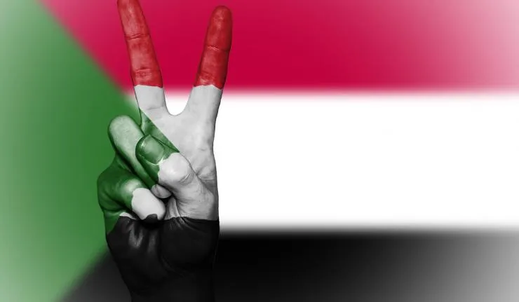 Sudan Flag And Peace Gesture 0.jpeg