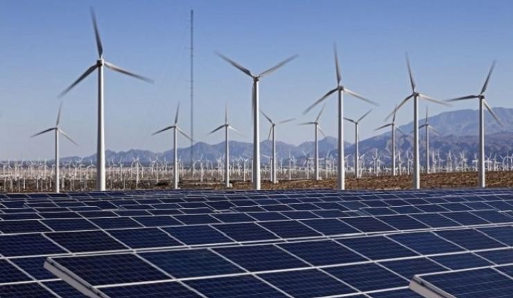 View Of Wind And Solar Farm In Desert 696x463 696x463