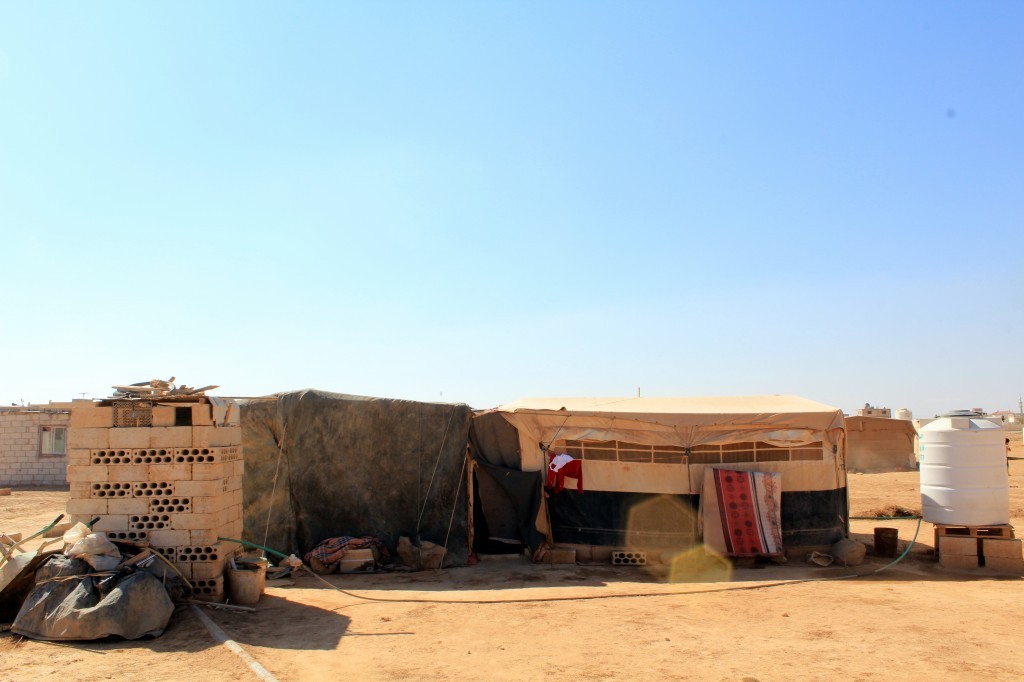 A "temporary" settlement that is home to an extended Syrian family in Mafraq governorate. (Credit: Lucas de Abreu, October 2014) A "temporary" settlement that is home to an extended Syrian family in Mafraq governorate. (Credit: Lucas de Abreu, October 2014)