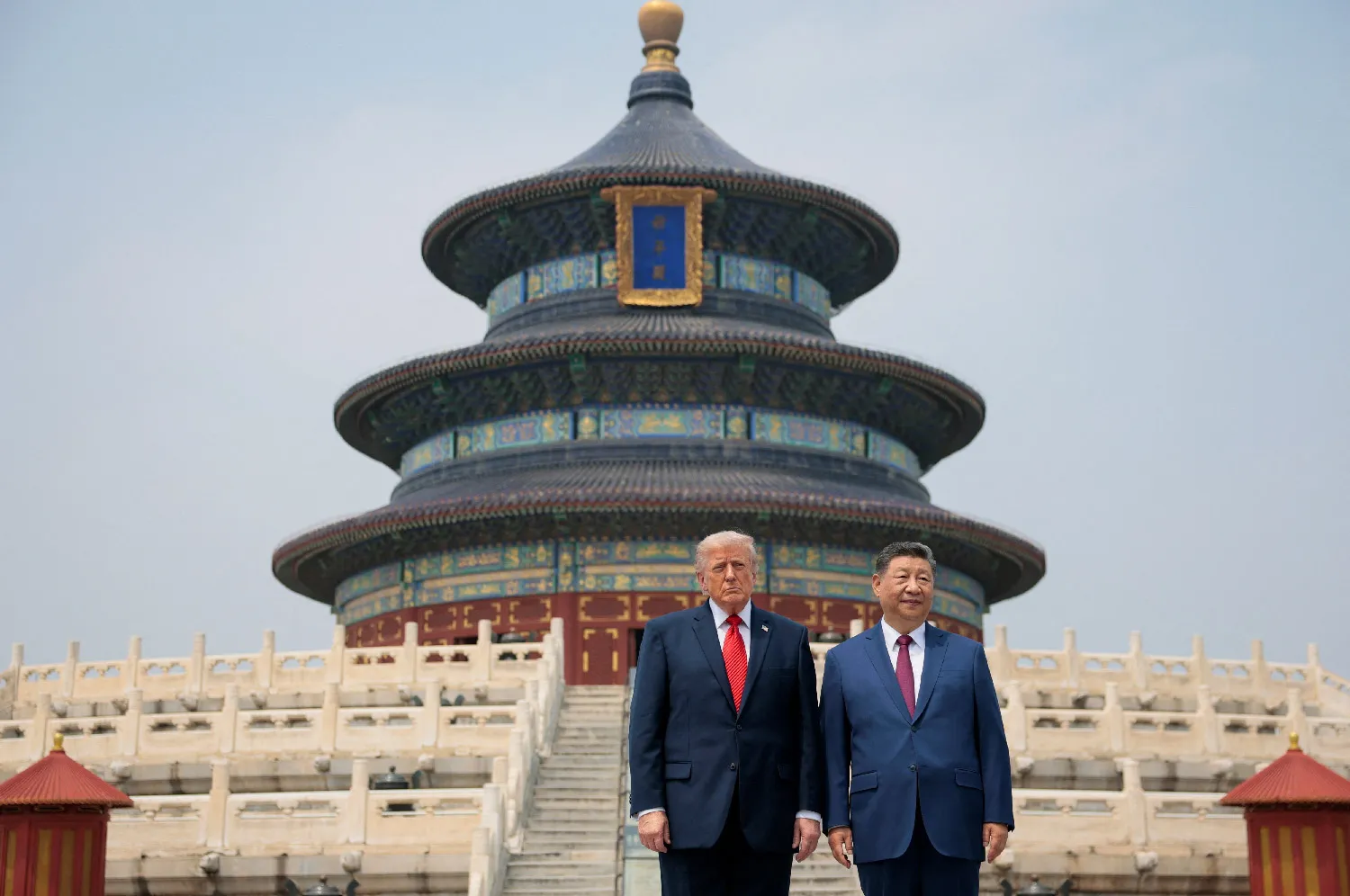 U.S. President Donald Trump and Chinese President Xi Jinping stand together as they tour the Temple of Heaven in Beijing, China, May 14, 2026. 